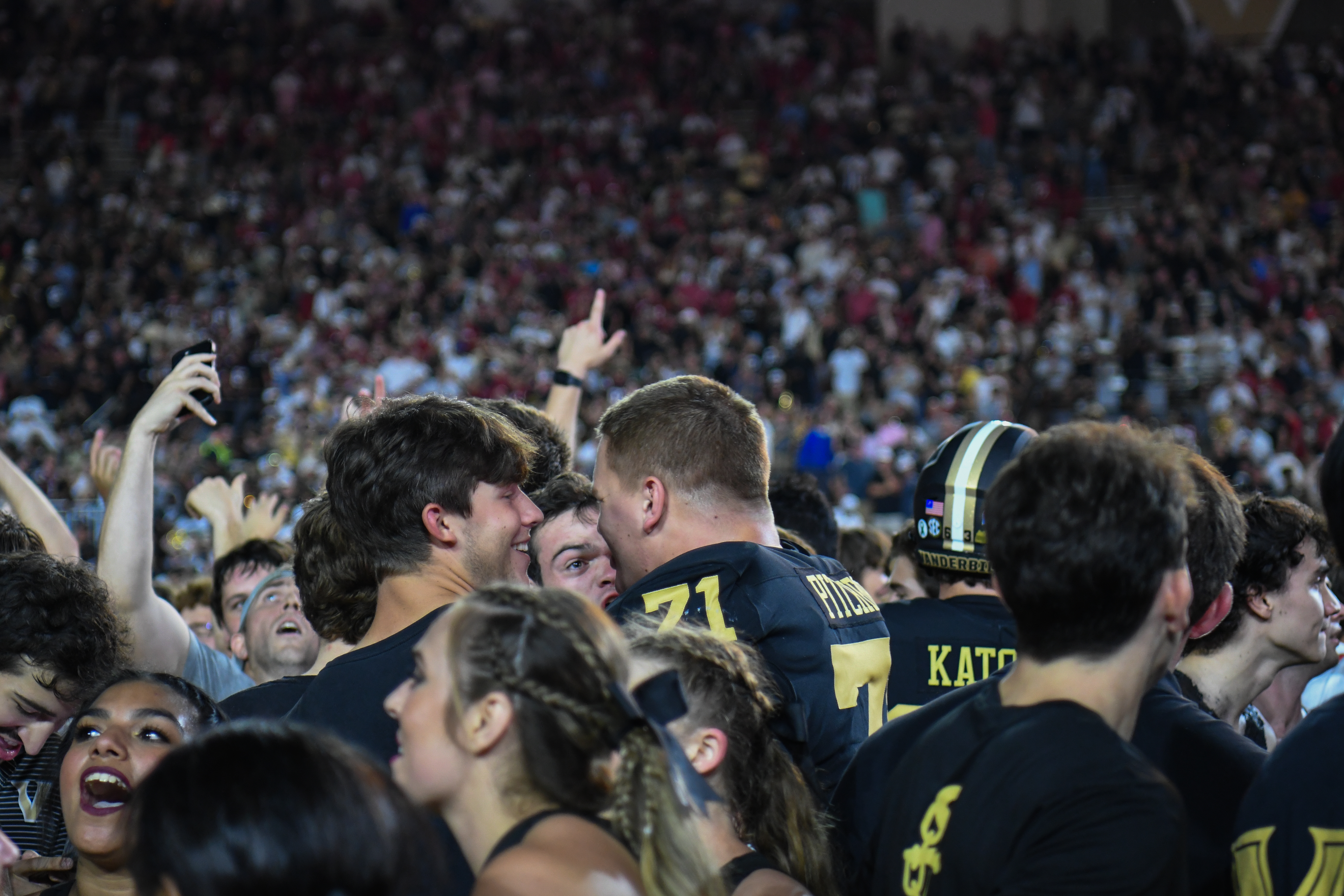 Fans and players celebrate a Vanderbilt Football win